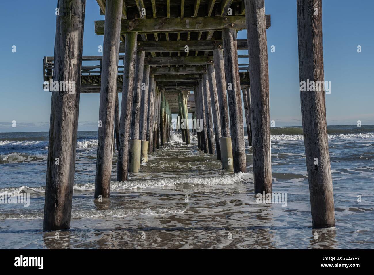 Waves crash around fishing pier, Avalon, New Jersey Stock Photo Alamy
