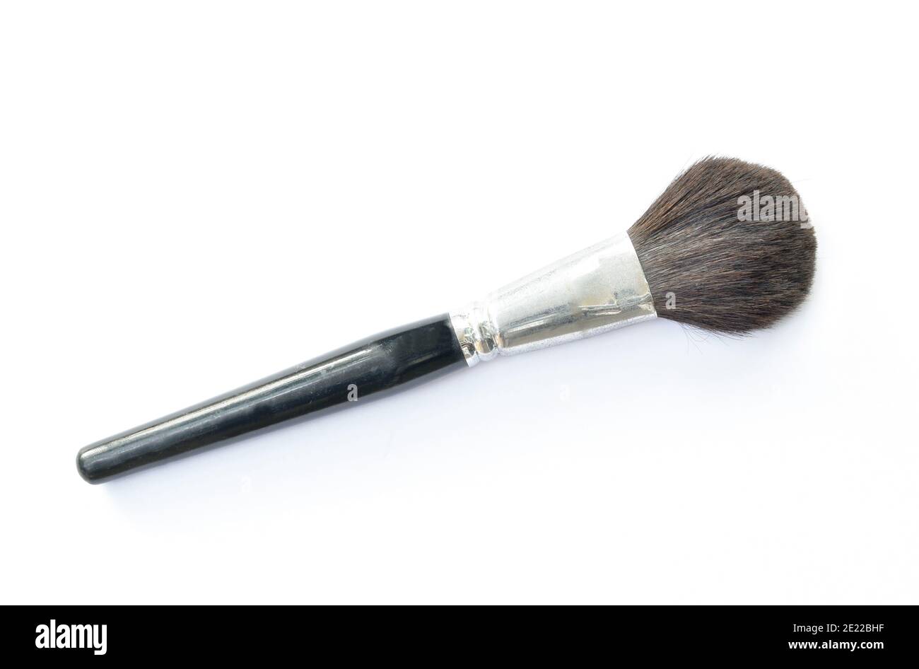 cheek brush with black handle on white background Stock Photo