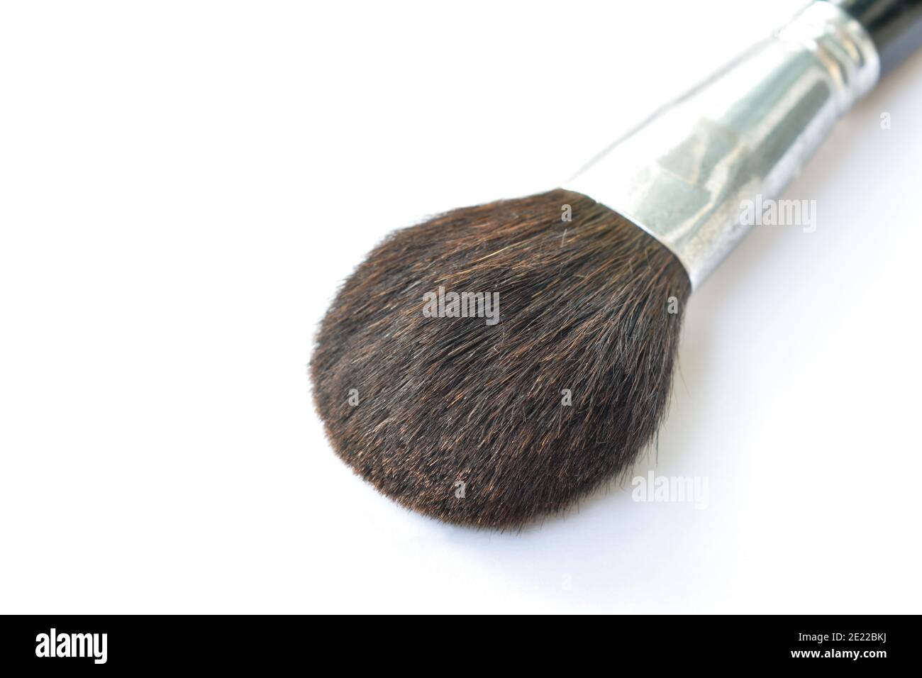 cheek brush with black handle on white background Stock Photo