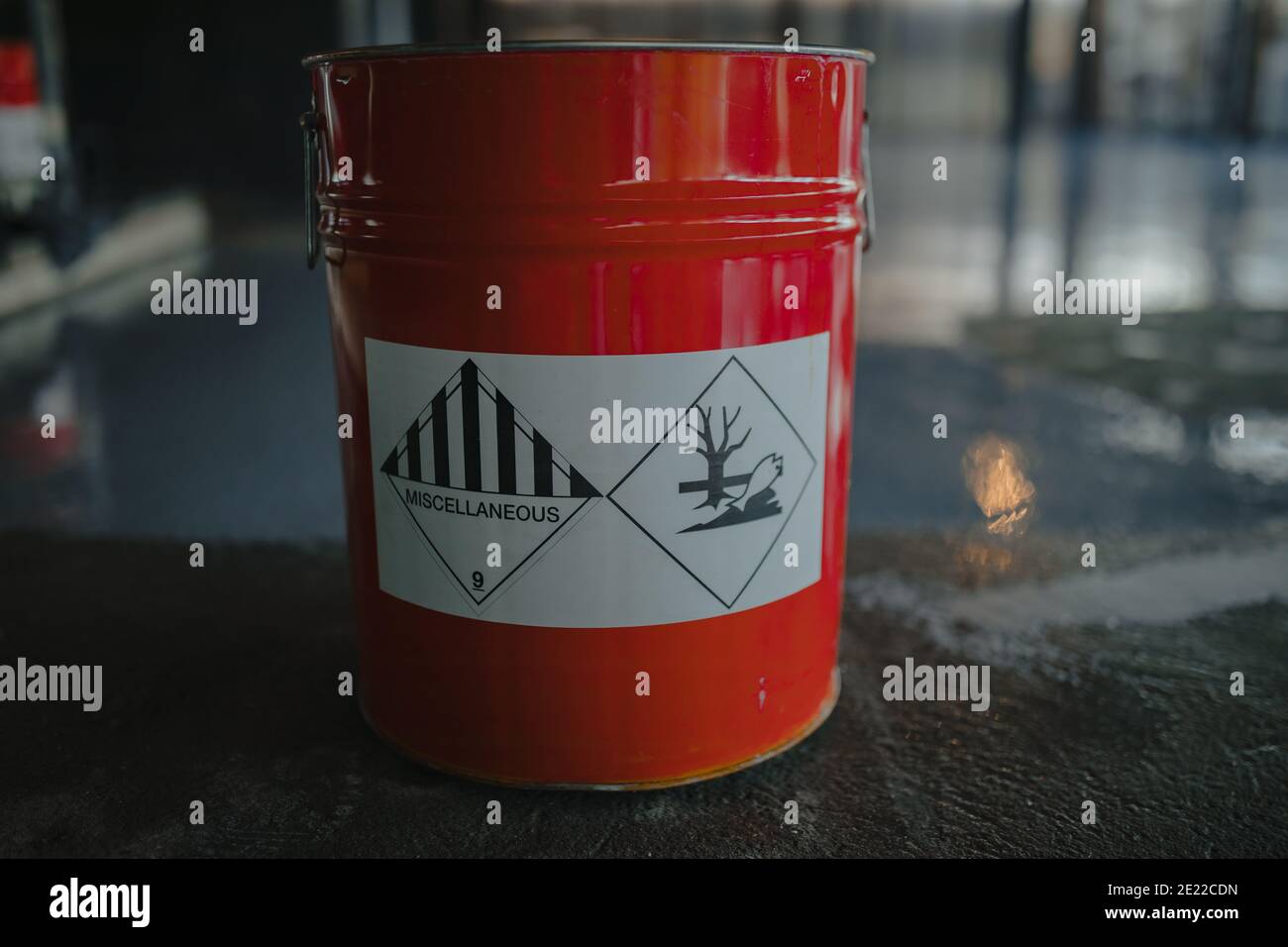 Tin bucket with toxic composition and epoxy resin inside Stock Photo