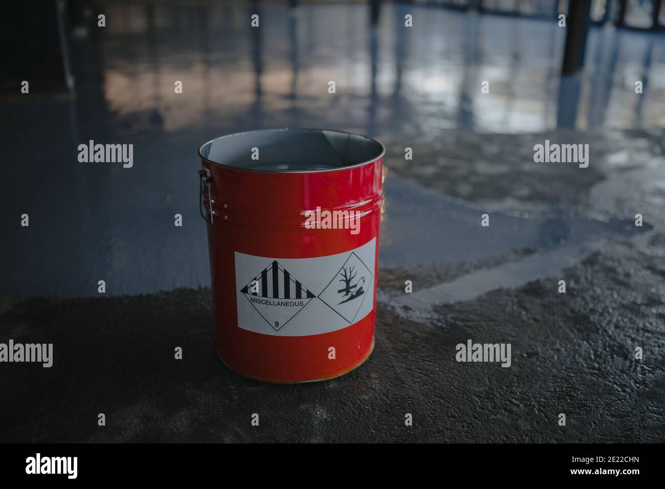 Tin bucket with toxic composition and epoxy resin inside Stock Photo