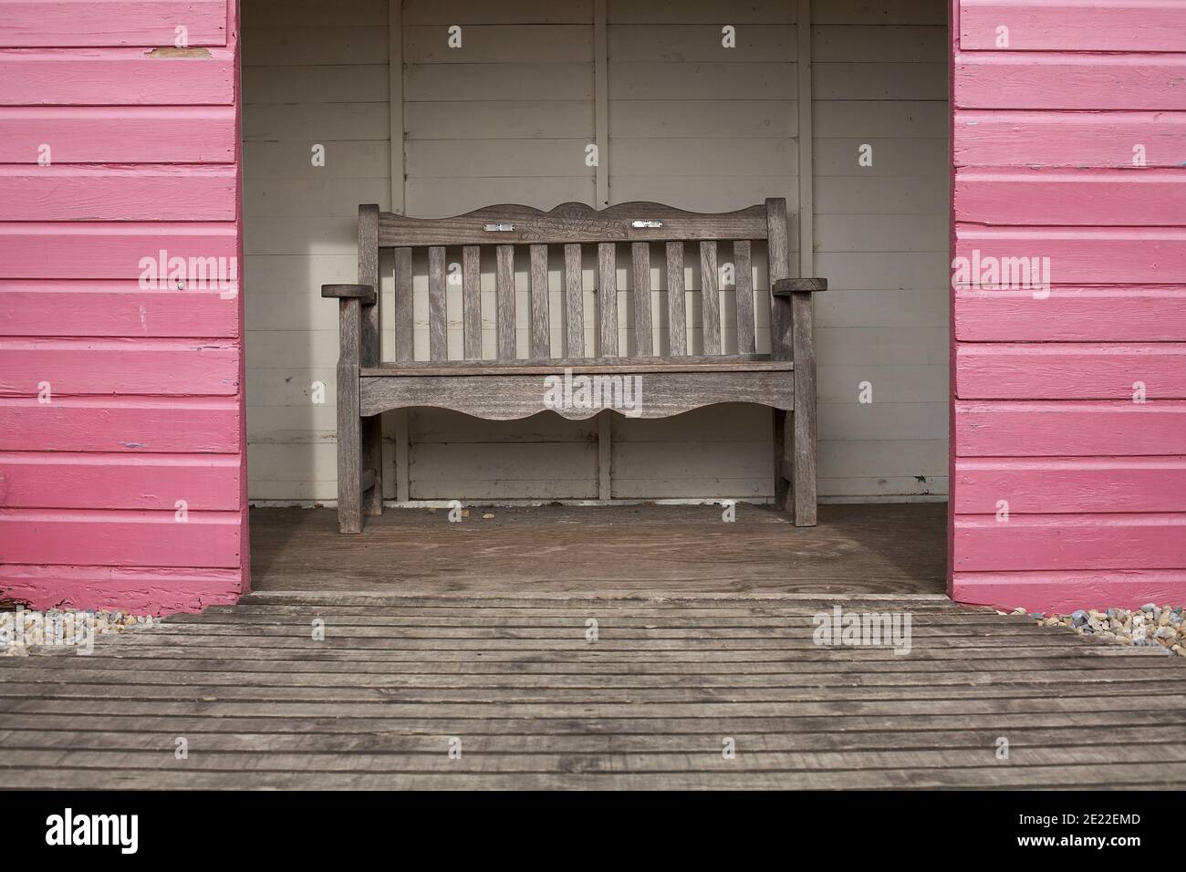 bench in pink shelter Stock Photo