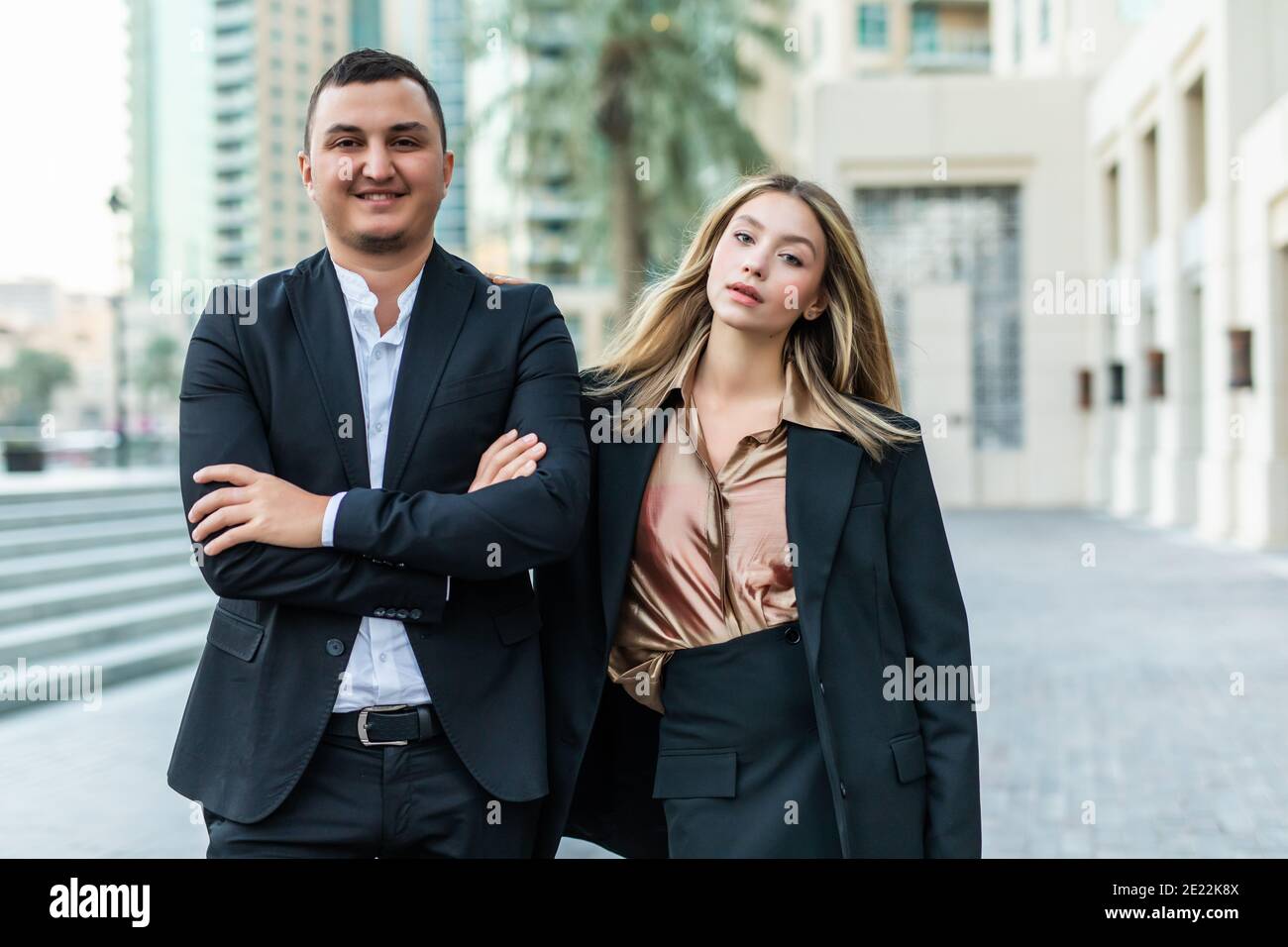 Business people walking and talking in the street Stock Photo - Alamy
