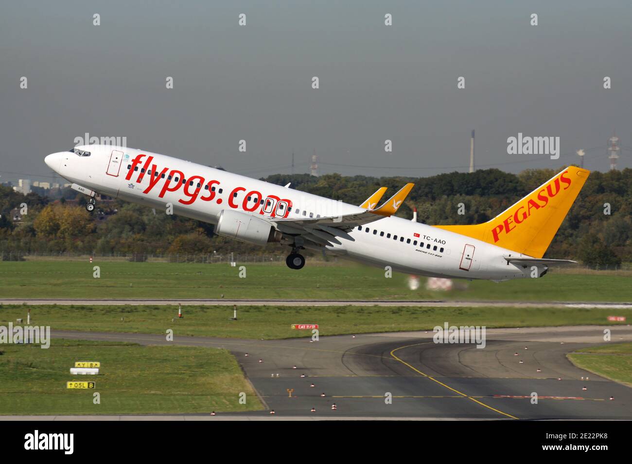 Turkish Pegasus Airlines Boeing 737-800 with registration TC-AAO just departed from runway 23L of Dusseldorf Airport. Stock Photo