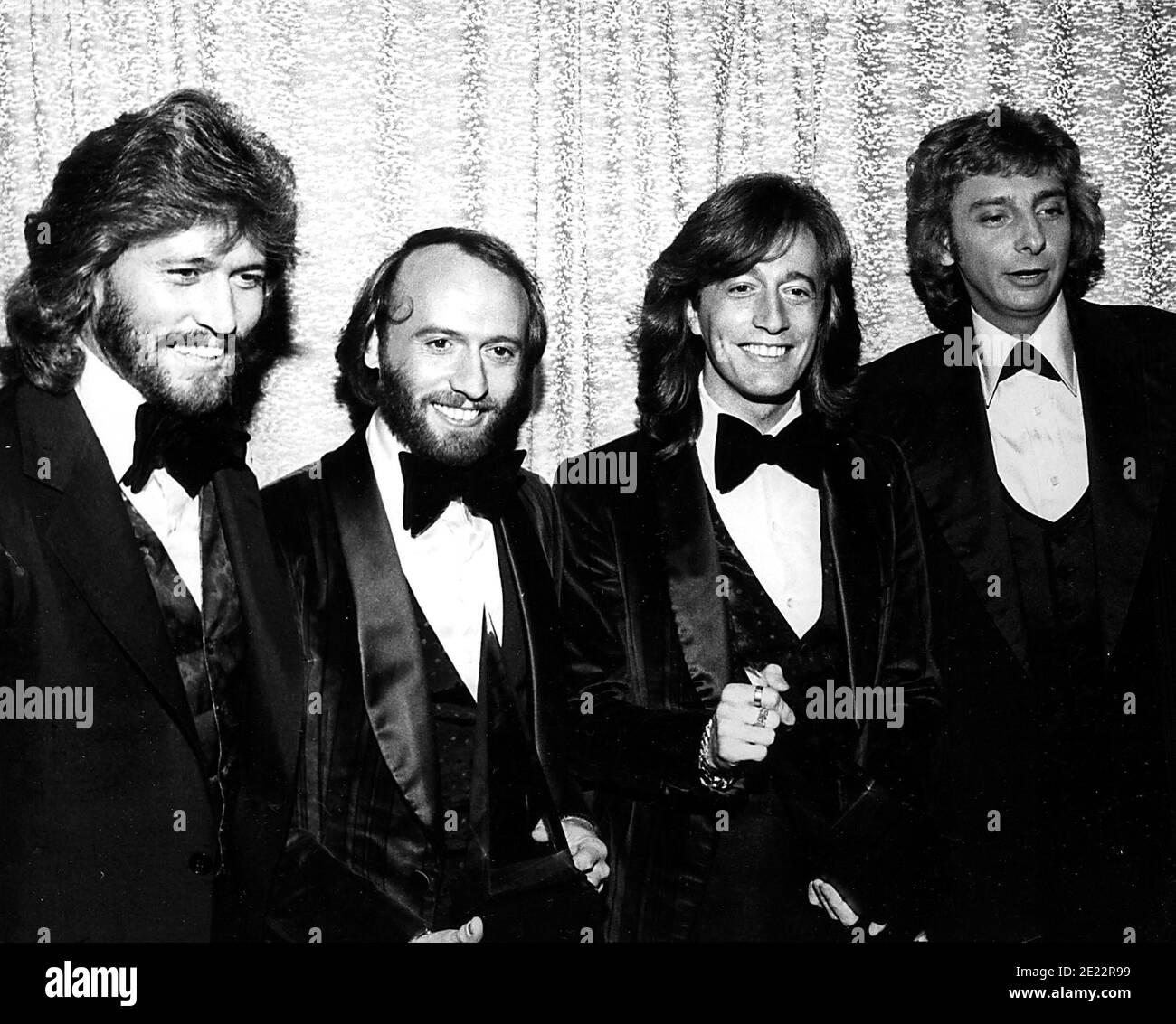 The Bee Gees   Barry, Maurice And Robin Gibb With Barry Manilow At The American Music Awards. 1979   Credit: Ralph Dominguez/MediaPunch Stock Photo
