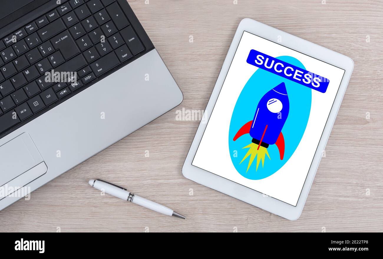 Success concept shown on a digital tablet Stock Photo