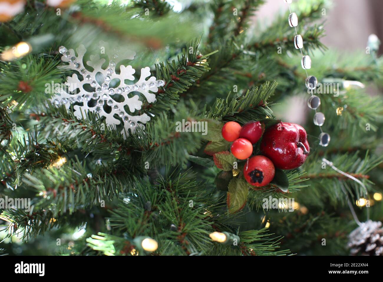 Blurry bright close up of decorations and fairy lights on a Christmas