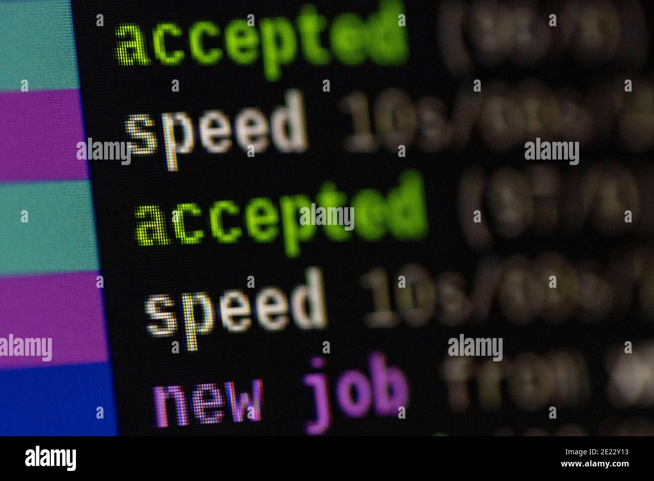 Colorful terminal window on computer screen with running software jobs for mining cryptocurrency and results Stock Photo