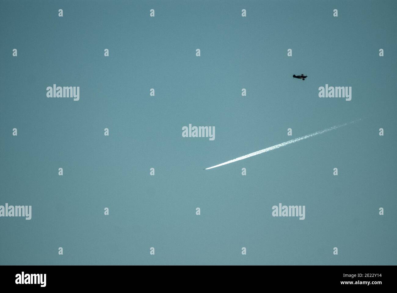 Airplane flying in the sky Stock Photo - Alamy