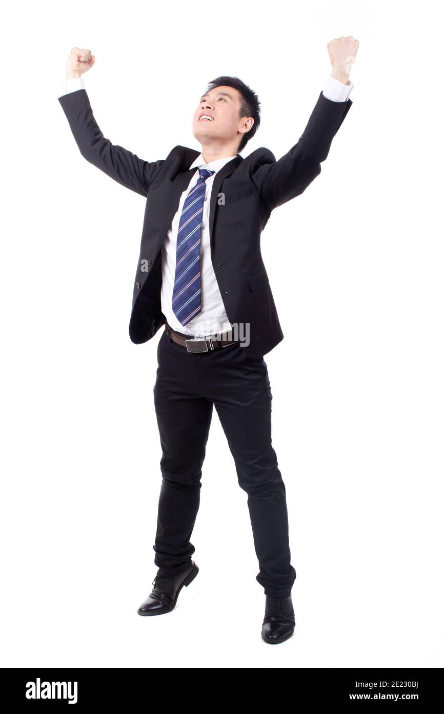 Happy handsome man cheering arms hi-res stock photography and images ...