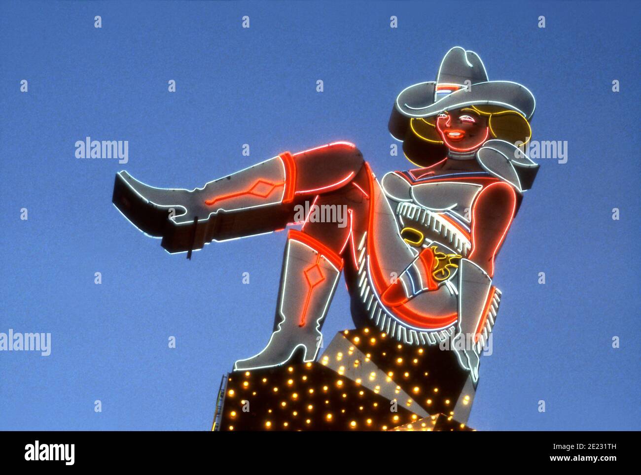 Neon cowgirl at Glitter Gulch on Fremont Street in Las Vegas, Nevada Stock Photo
