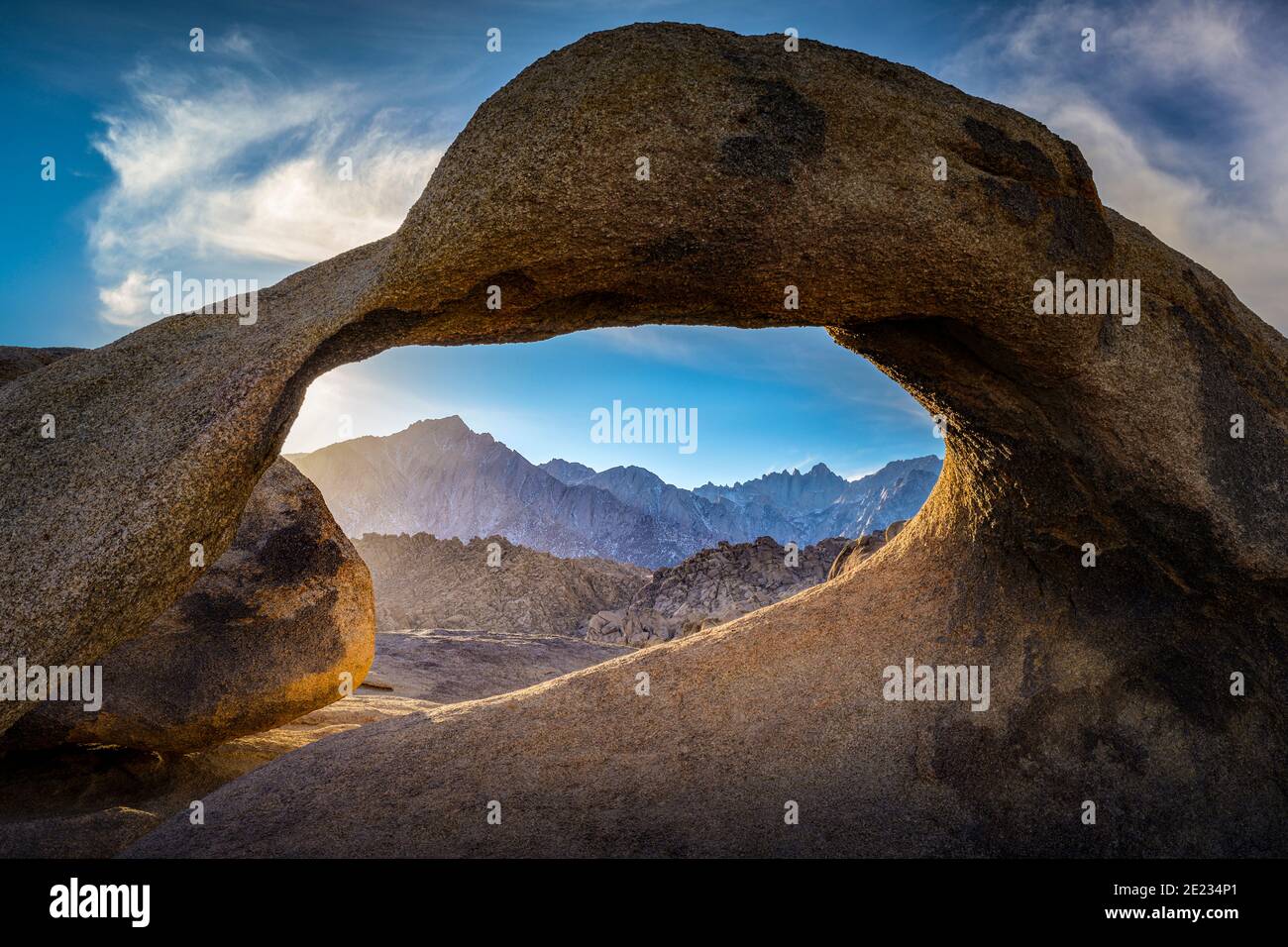 Mobius Arch, Alabama Hills, and snow on Sierra Nevada Mountain Range, California, USA Stock Photo