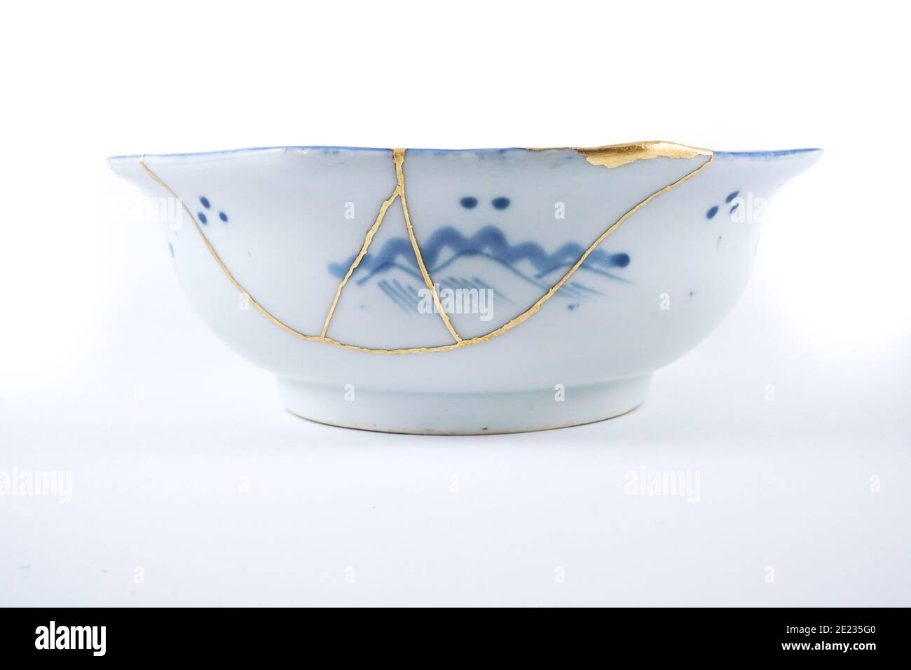 Antique Japanese Kintsugi bowl blue and white Stock Photo Alamy