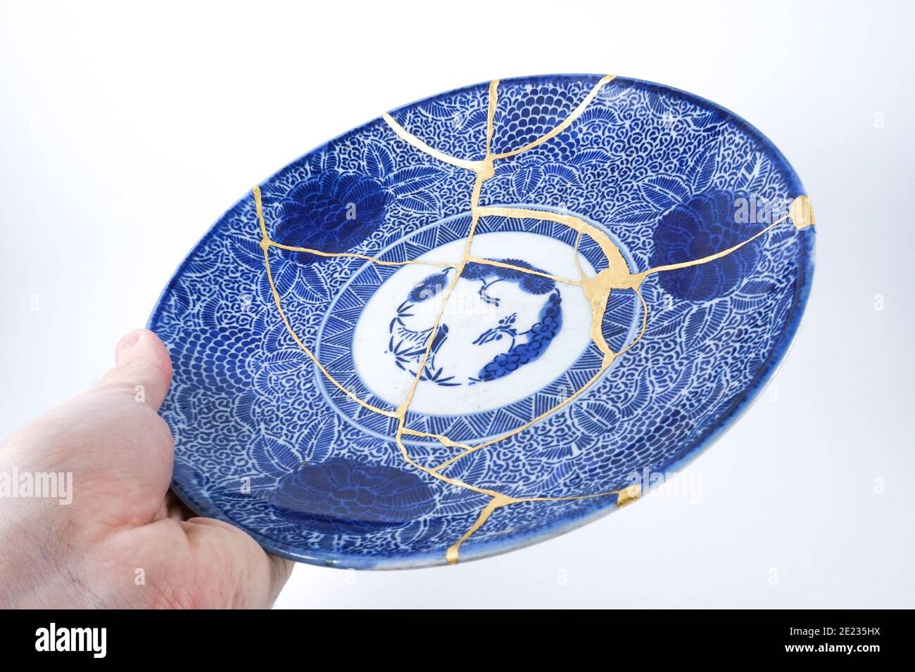 Japanese antique Kintsugi big plate restored with real gold Stock Photo ...