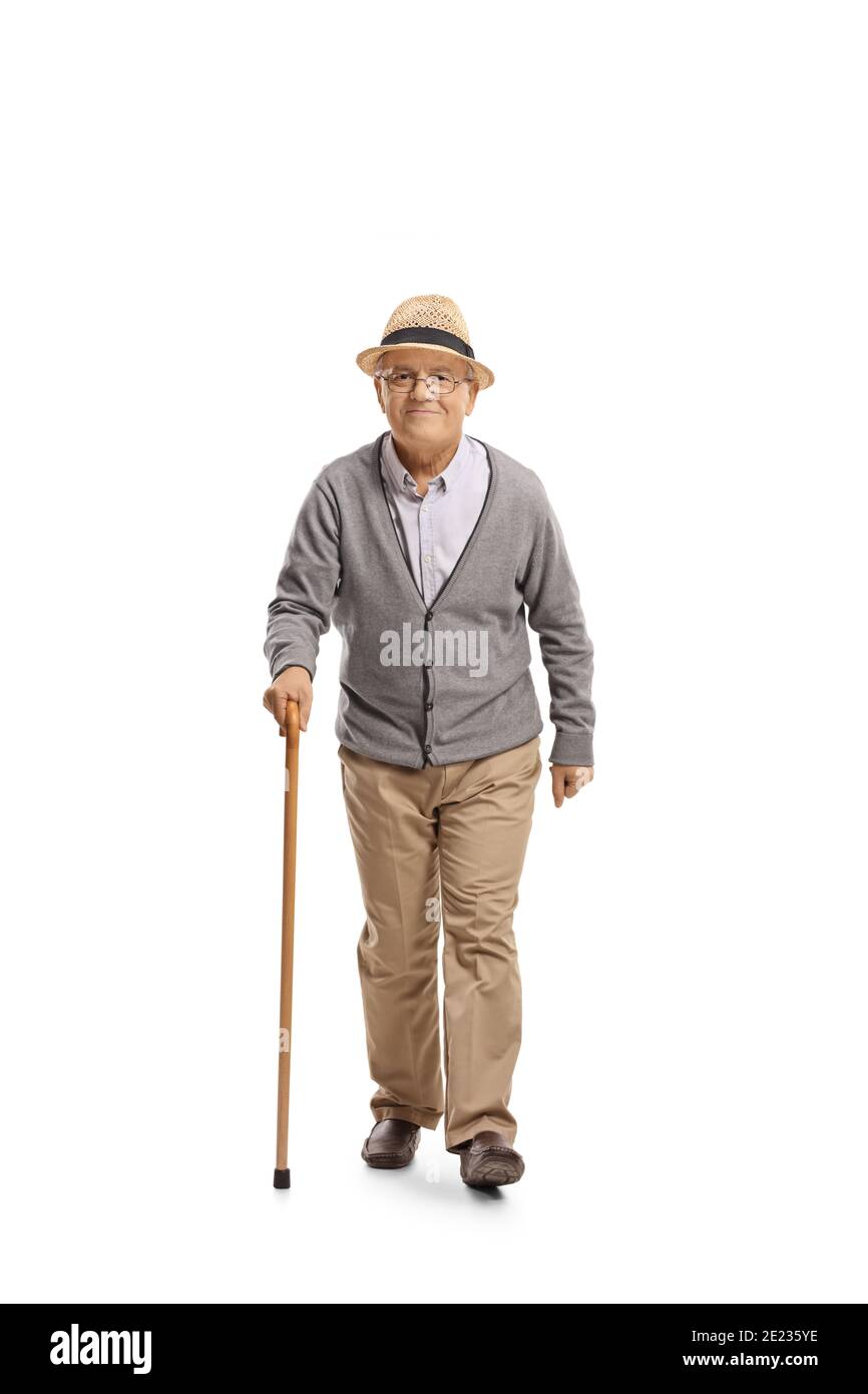 Full length portrait of an elderly gentleman with a cane walking and ...