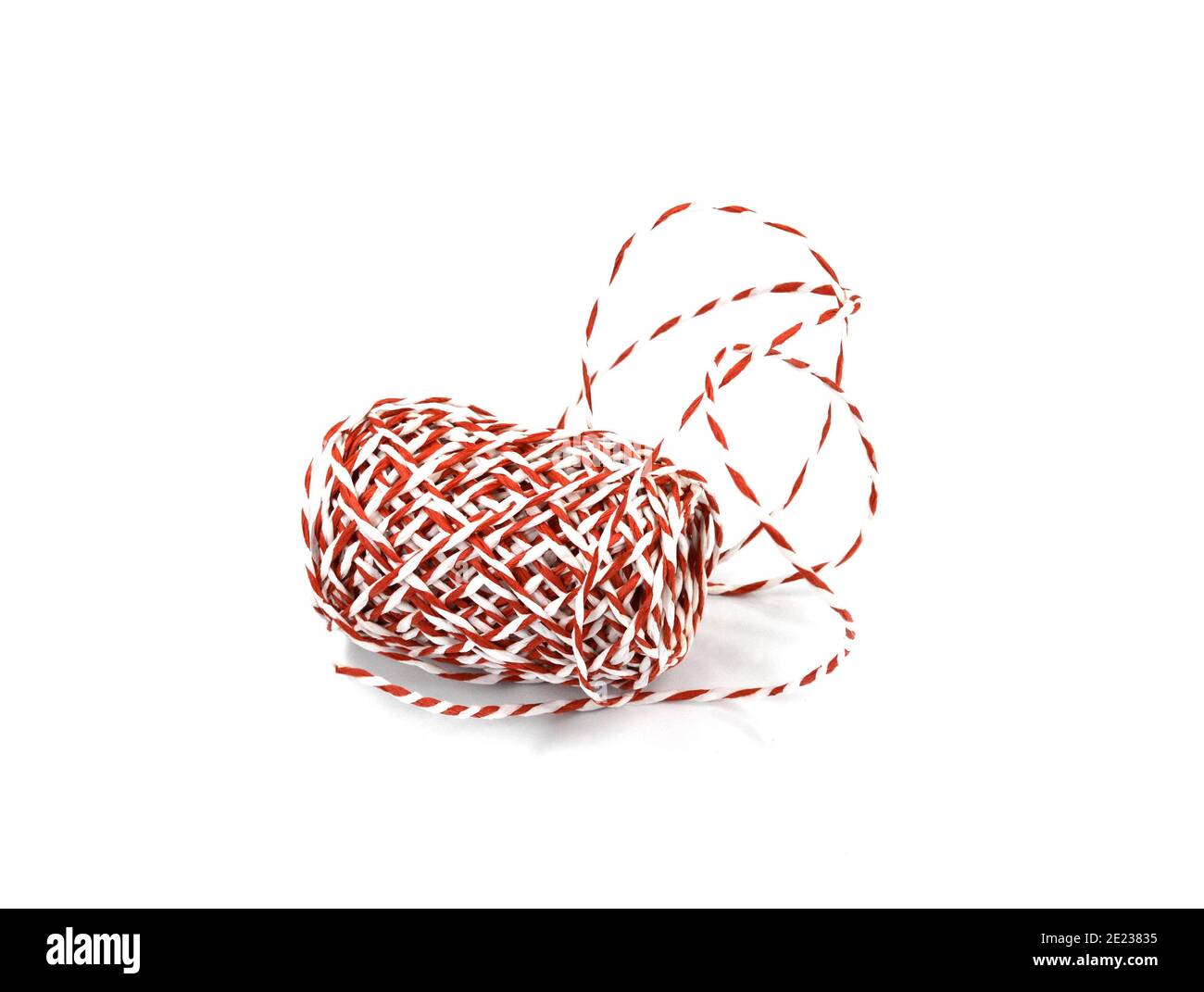 Red and white paper ribbon roll isolated on white background Stock