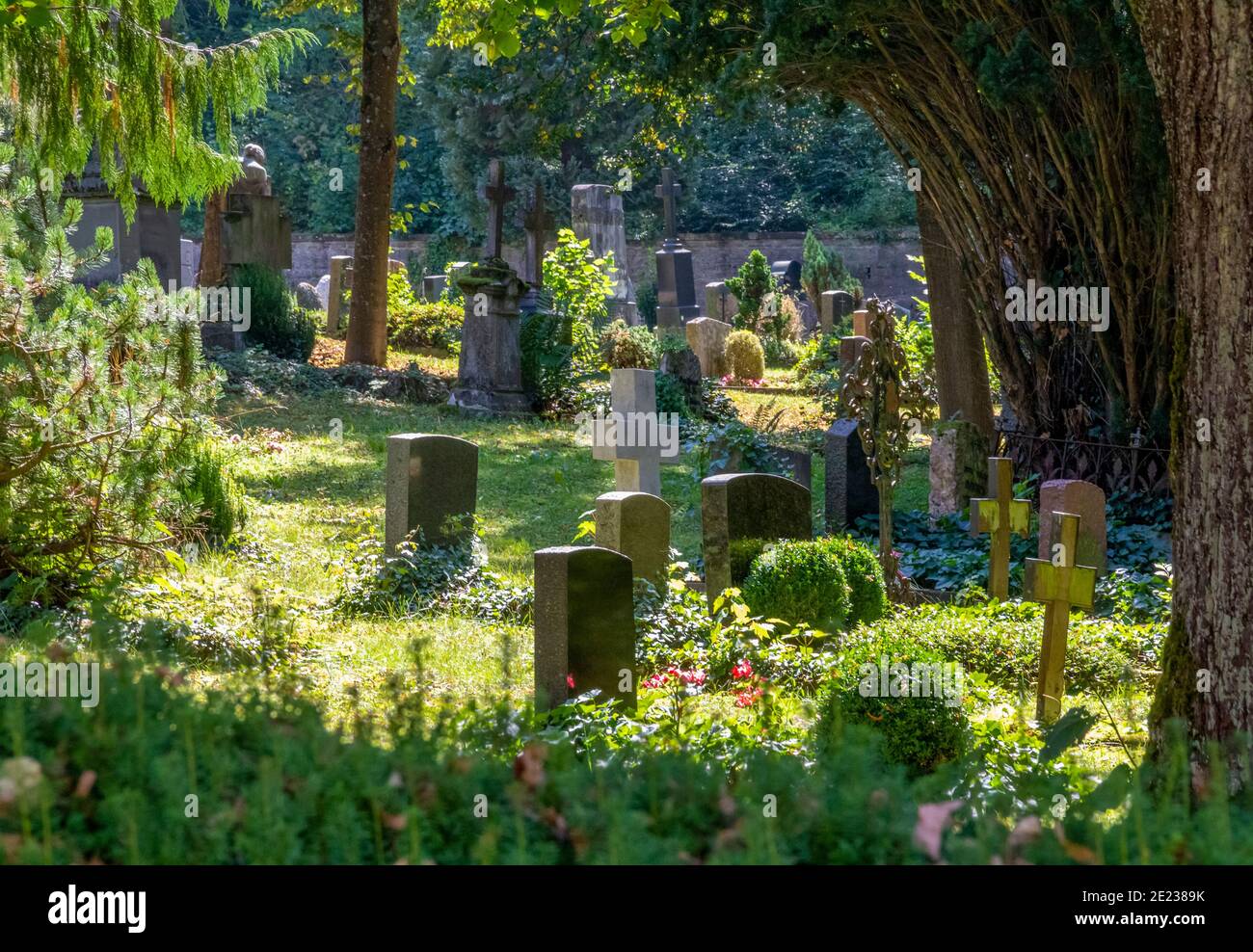 idyllic s sunny graveyard scenery in Schwaebisch Hall at summer time Stock Photo