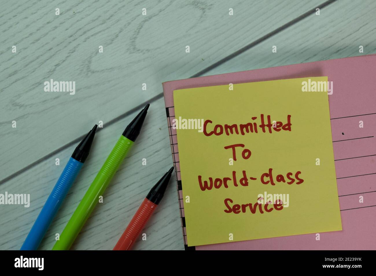 Committed To World Class Service Write On Sticky Notes Isolated On Wooden Table Stock Photo Alamy Committed To World Class Service Write On Sticky Notes Isolated On Wooden Table Stock Photo Alamy