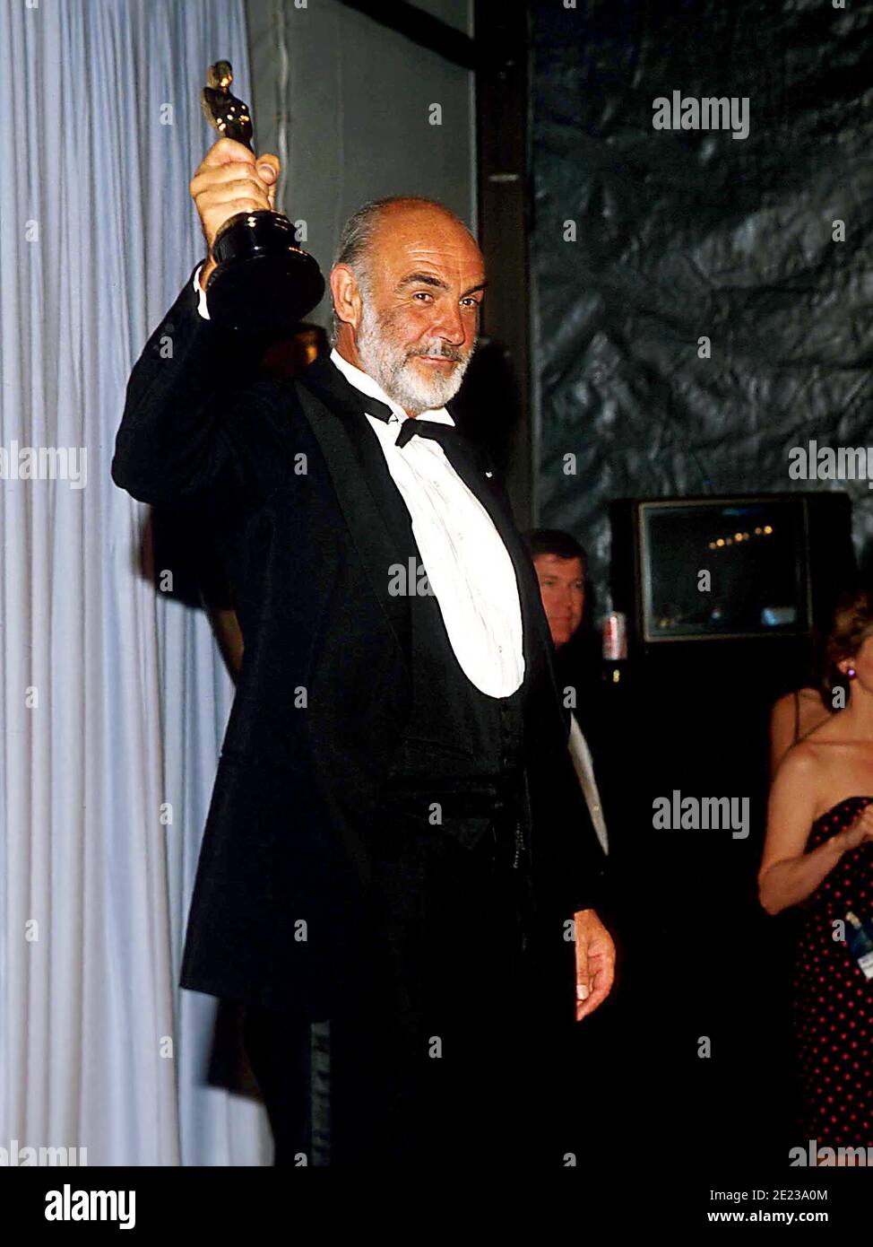 Sean Connery holds up his Oscar after winning the Best Supporting Actor
