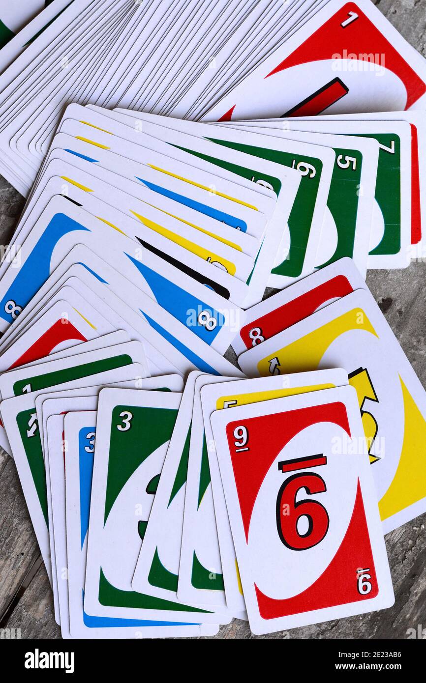 Background Of The Uno Playing Cards American Card Game Deck Of Uno Game Cards Scattered All Over On A Table Stock Photo Alamy