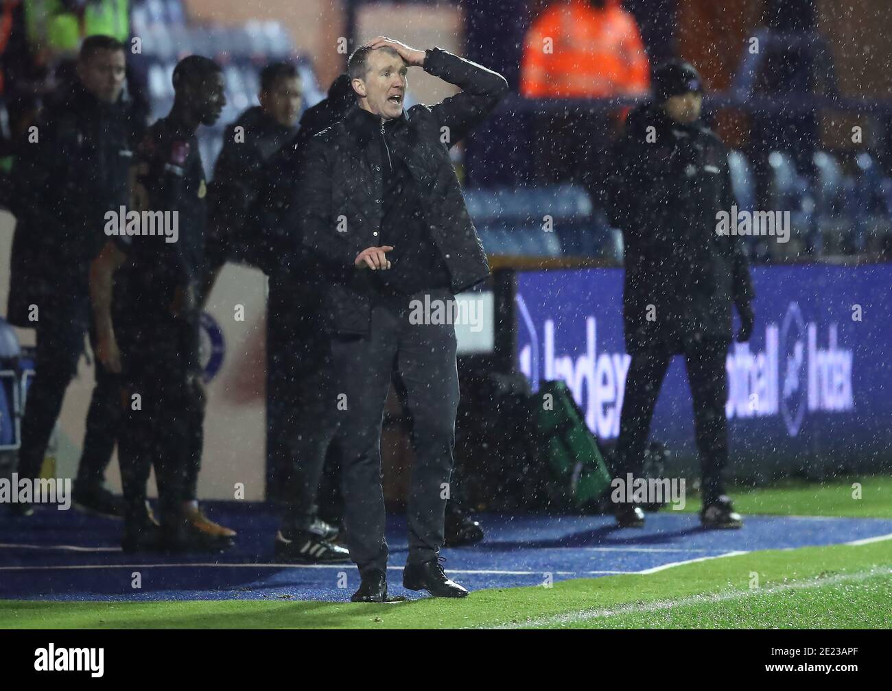Stockport county manager jim gannon on touchline hires stock