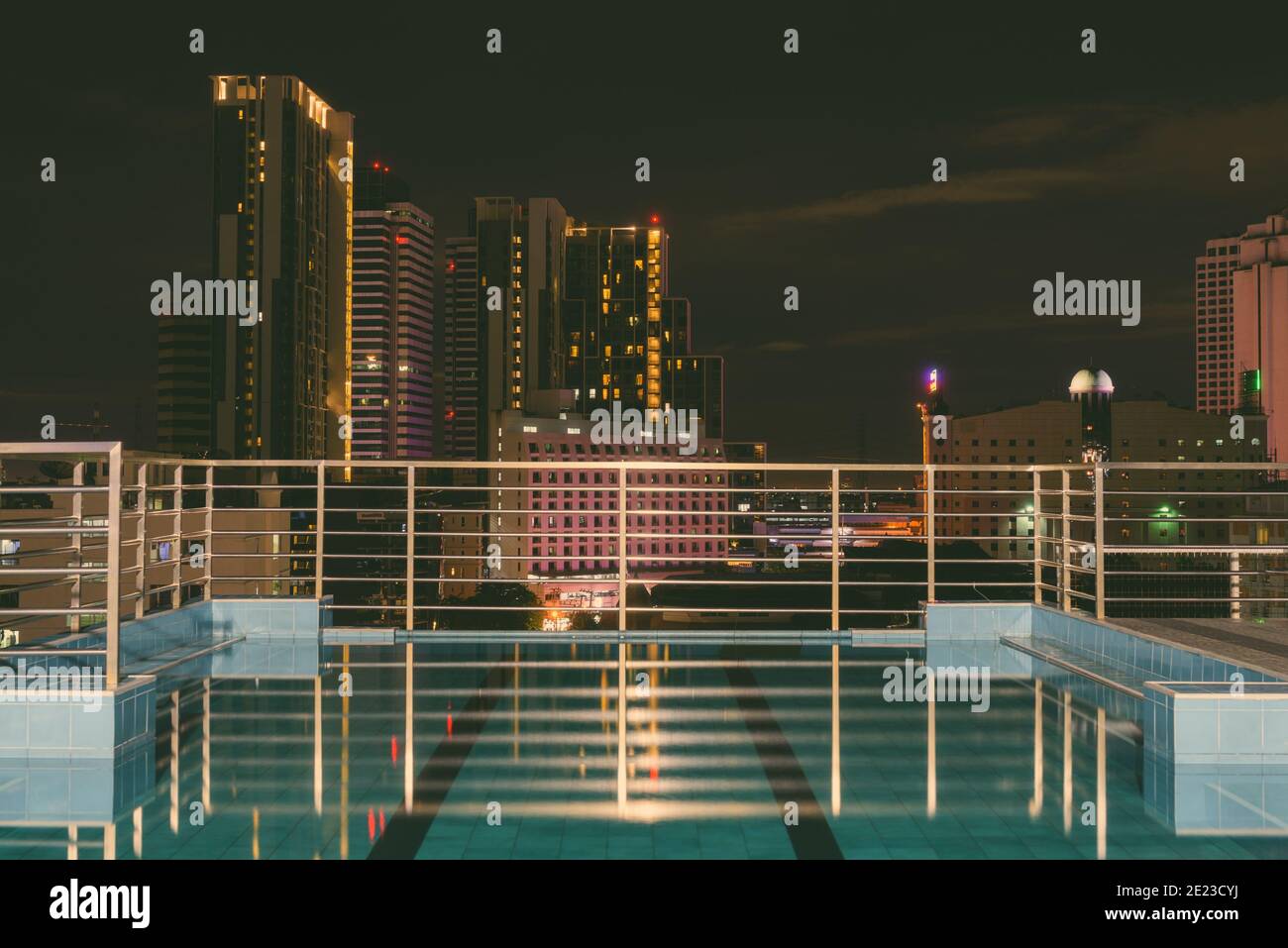 Rooftop Swimming Pool Overlooking The View Of Bangkok City At Night Stock Photo Alamy