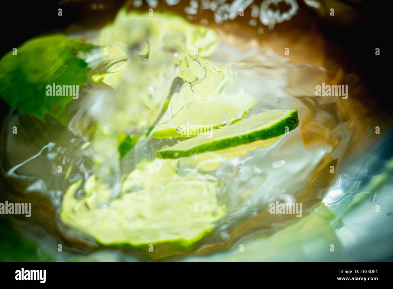 Lime in a glass of water. Stock Photo
