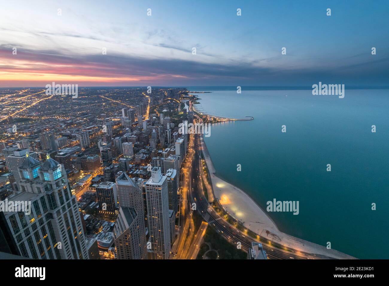 Chicago city lights and Lake Michigan seen from John Hancock building