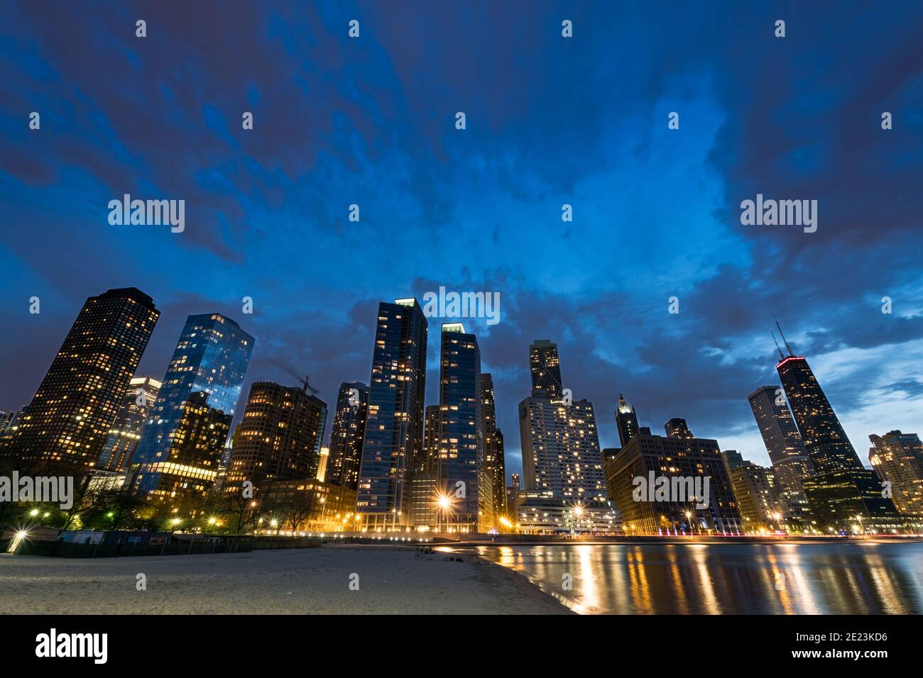 Chicago skyline seen from North Avenue beach at dusk Stock Photo