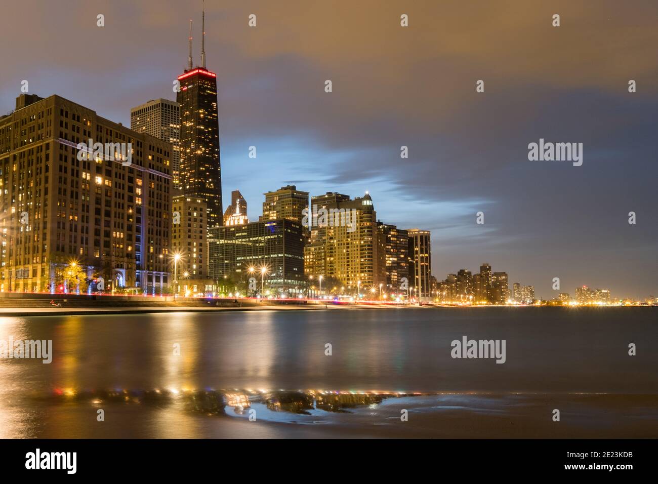 Chicago skyline seen from North Avenue beach at dusk Stock Photo
