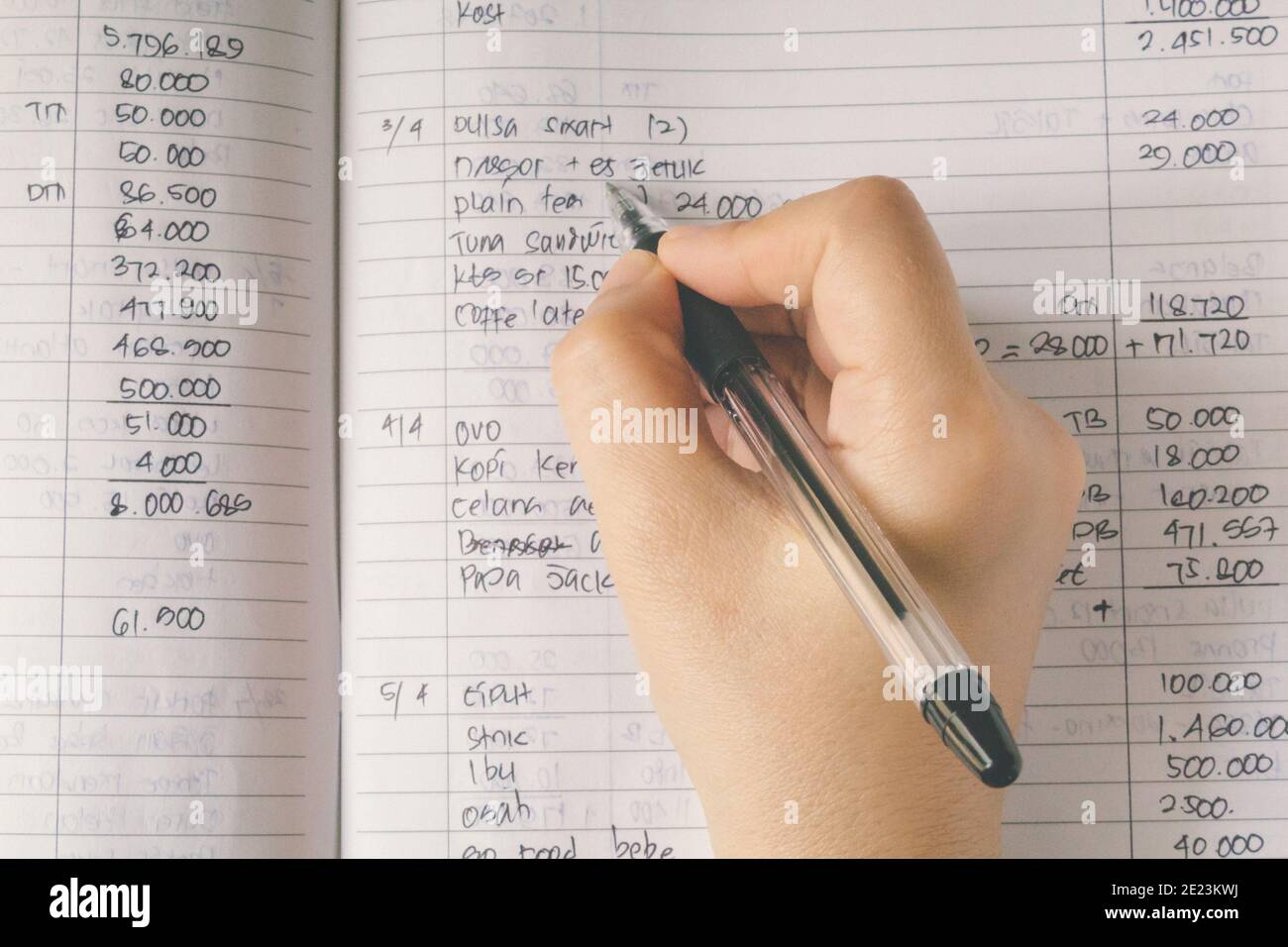 Top view of a male hand doing some business calculation - Business and ...