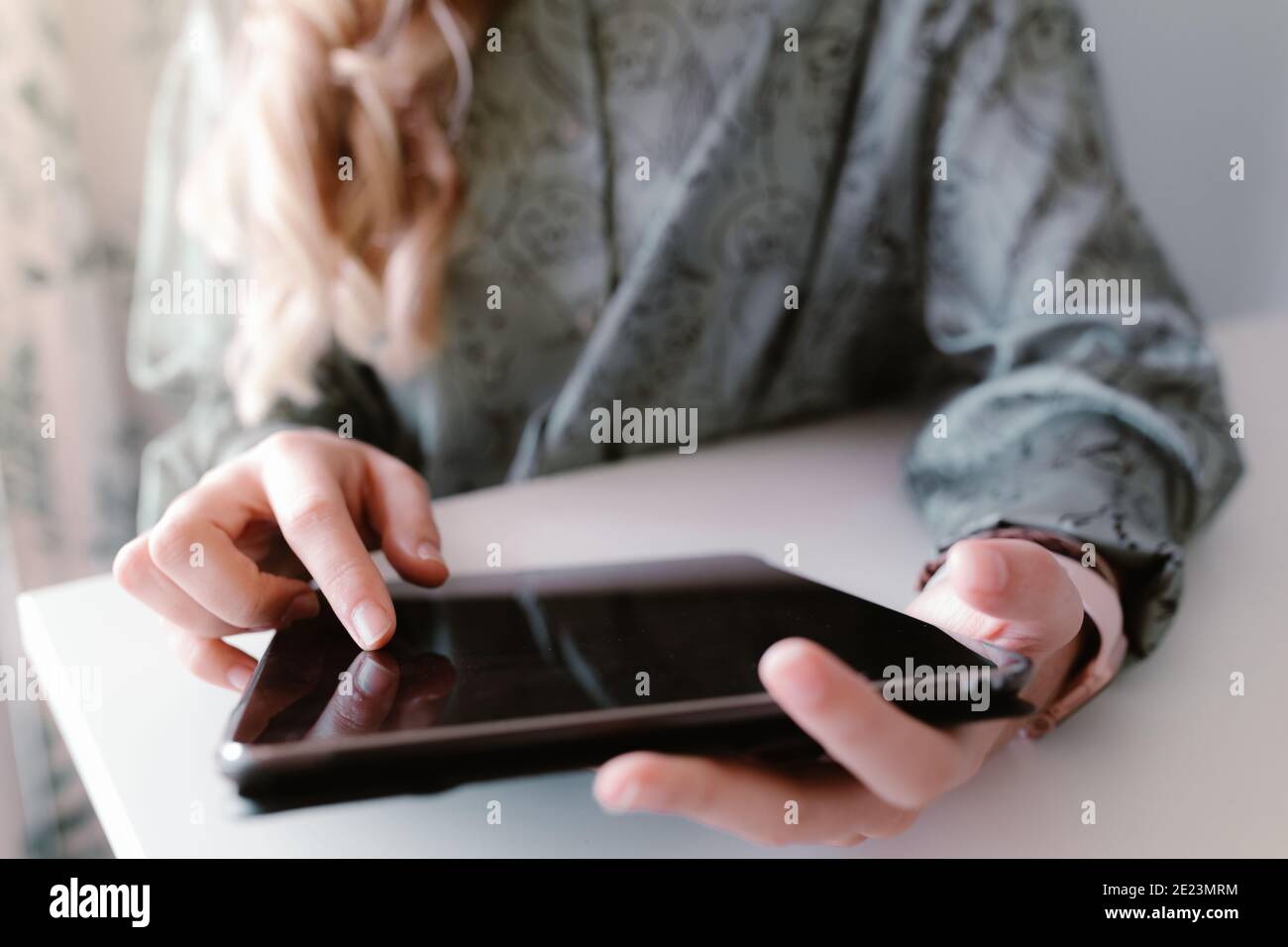 Young woman using digital tablet Stock Photo