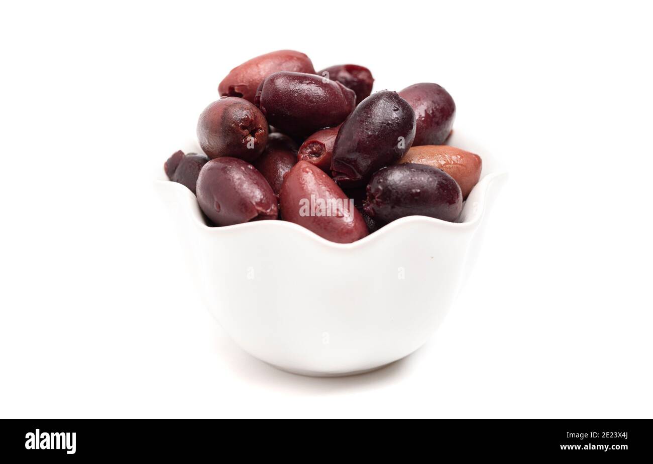 Purple Colored Kalamata Olives Isolated on a White Background Stock