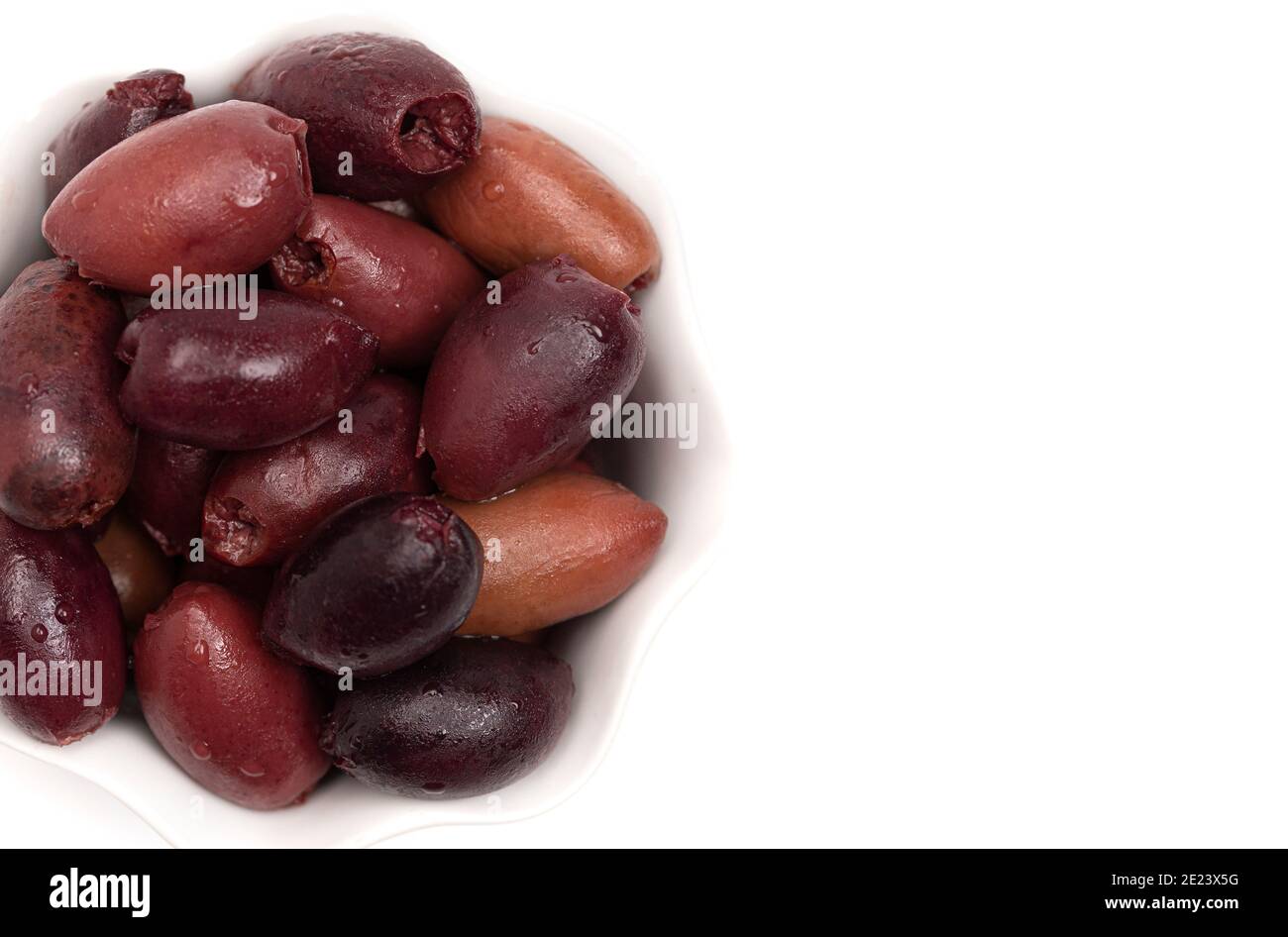 Purple Colored Kalamata Olives Isolated on a White Background Stock