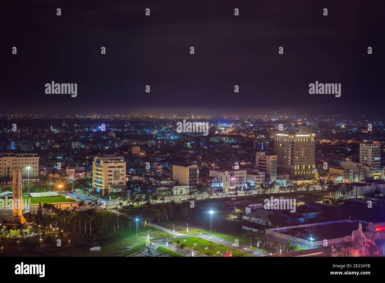 The architecture shimmering under the night-lit city makes the city more vibrant in Da Nang, Vietnam Stock Photo