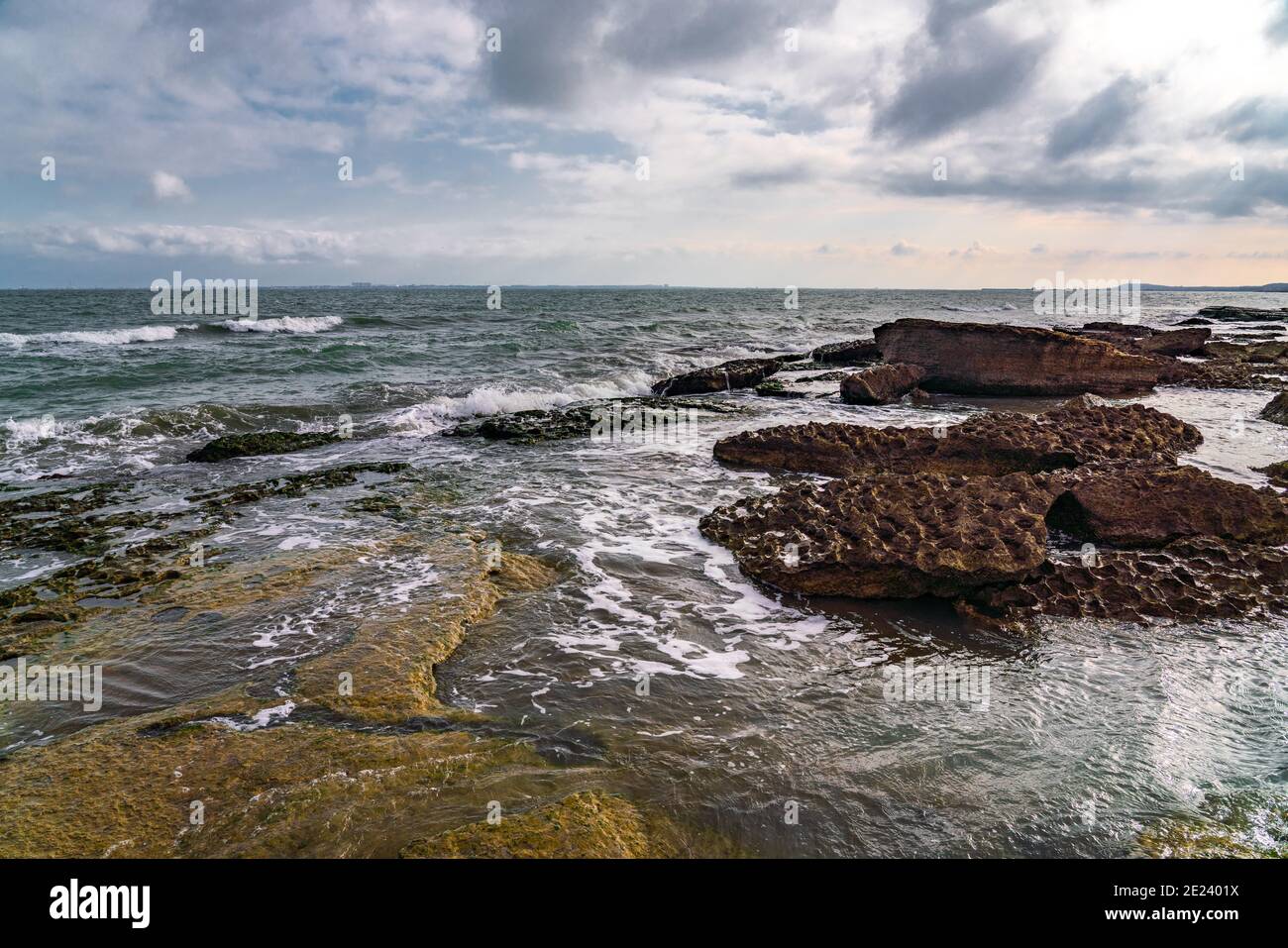 Beautiful rocks of amazing shapes on sea shore Stock Photo - Alamy