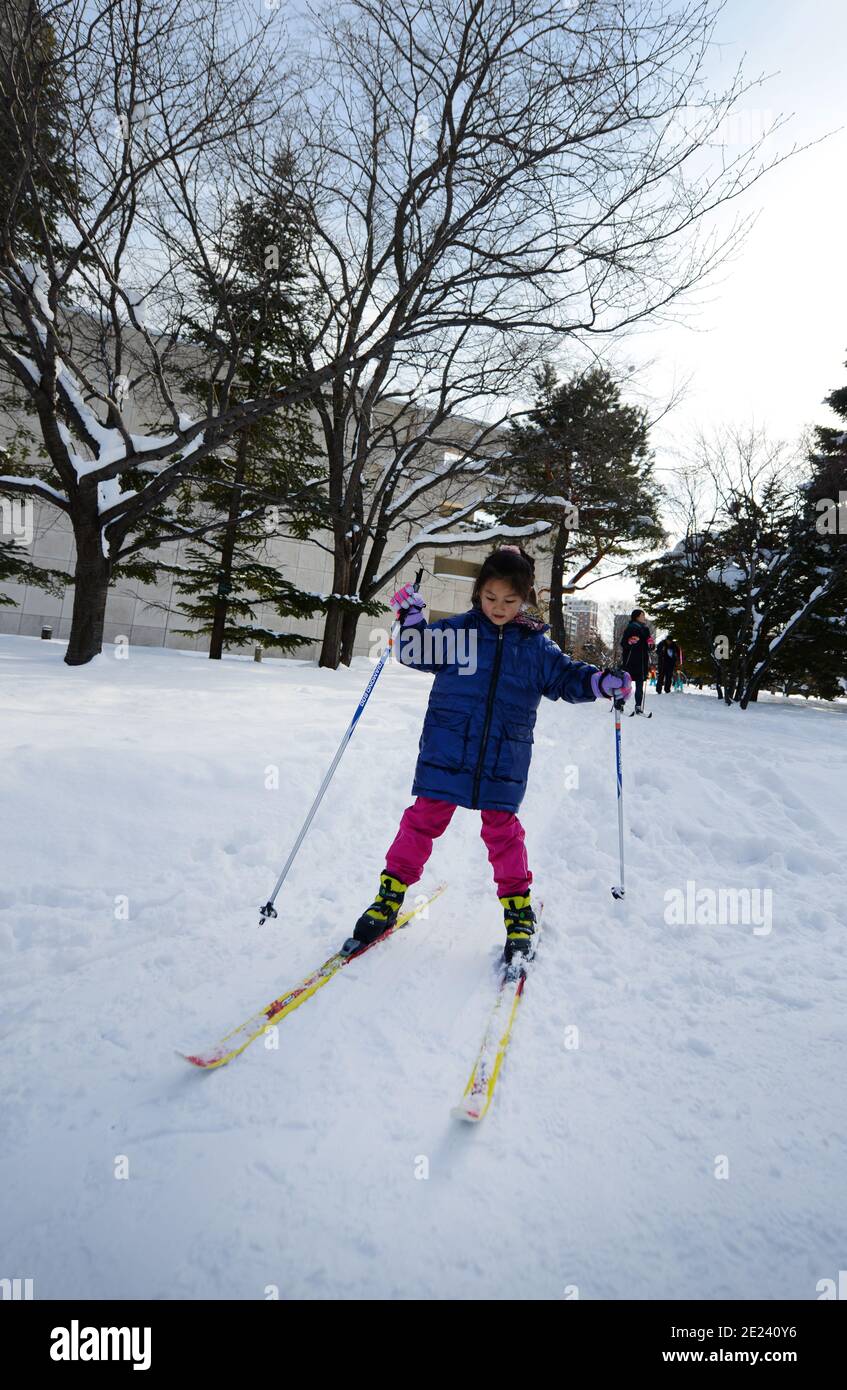 Chinese tourist practicing crosscountry ski in Nakajima Park in