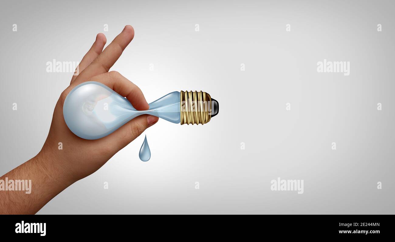 Creative juices and creativity concept as a fresh idea symbol or business ideas icon as a hand squeezing innovation from a light bulb. Stock Photo