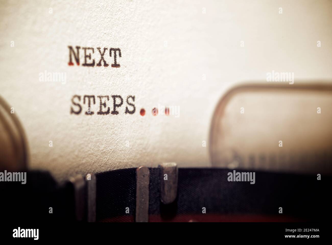 Next steps phrase written with a typewriter Stock Photo Alamy
