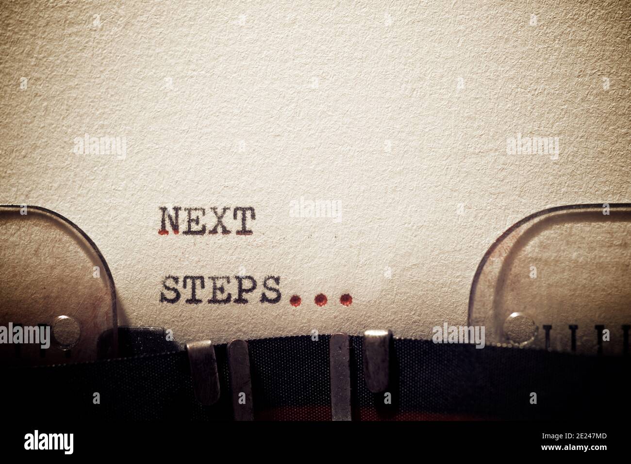 Next steps phrase written with a typewriter Stock Photo Alamy