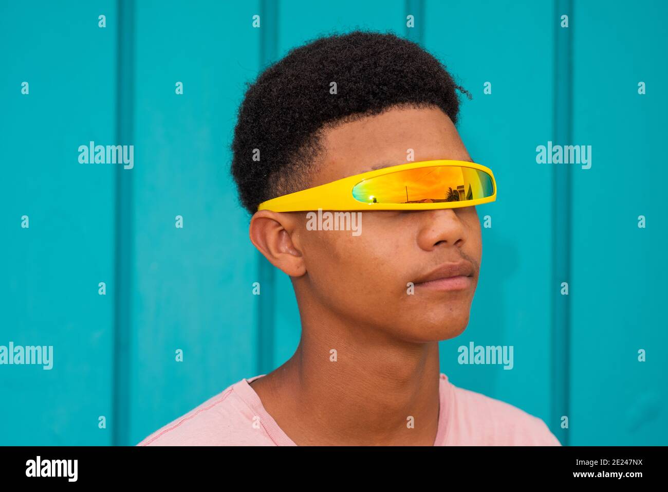 Portrait of teenager with futuristic looking glasses Stock Photo