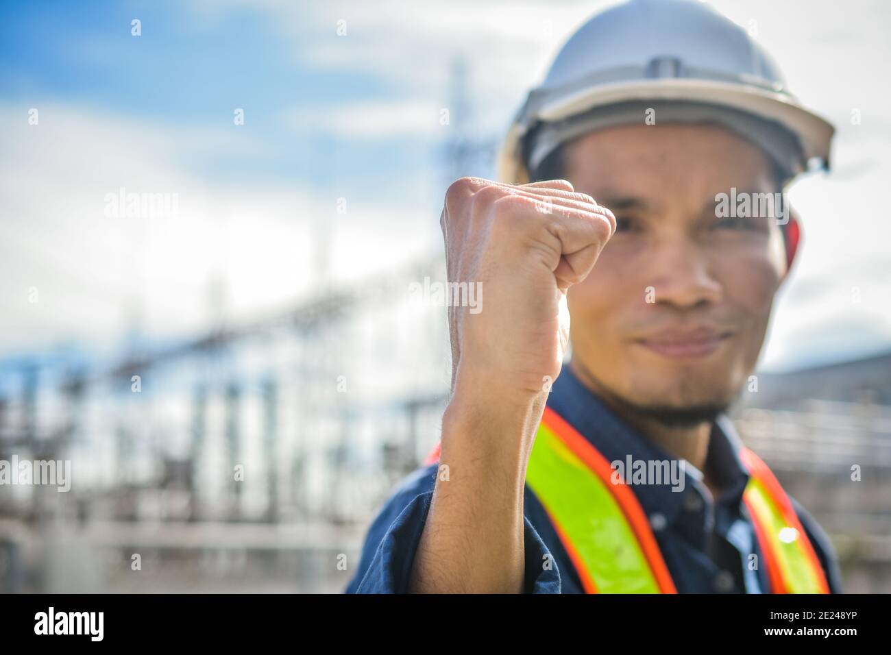 Engineer success at high volte station Stock Photo