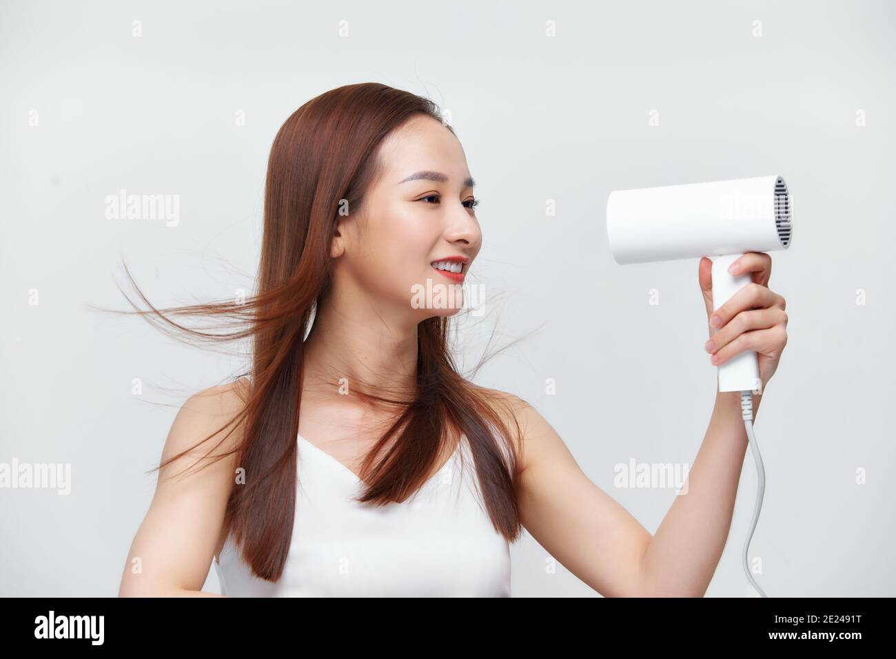 Over the head hair dryer hi-res stock photography and images - Alamy