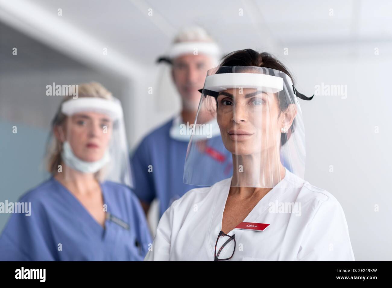 Doctor wearing personal protective equipment in hospital Stock Photo