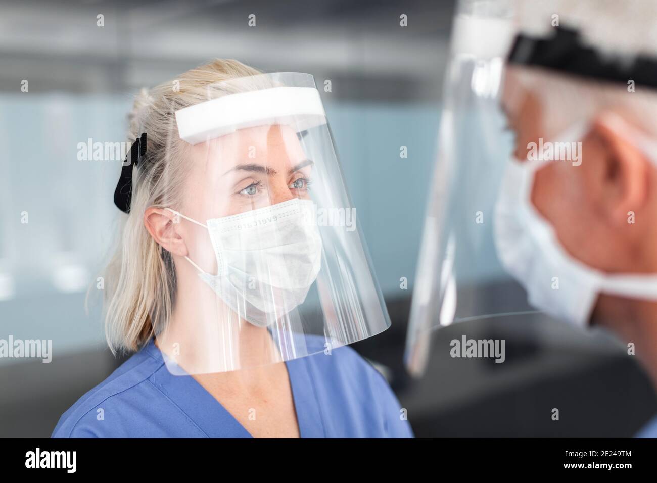 Doctors wearing personal protective equipment Stock Photo