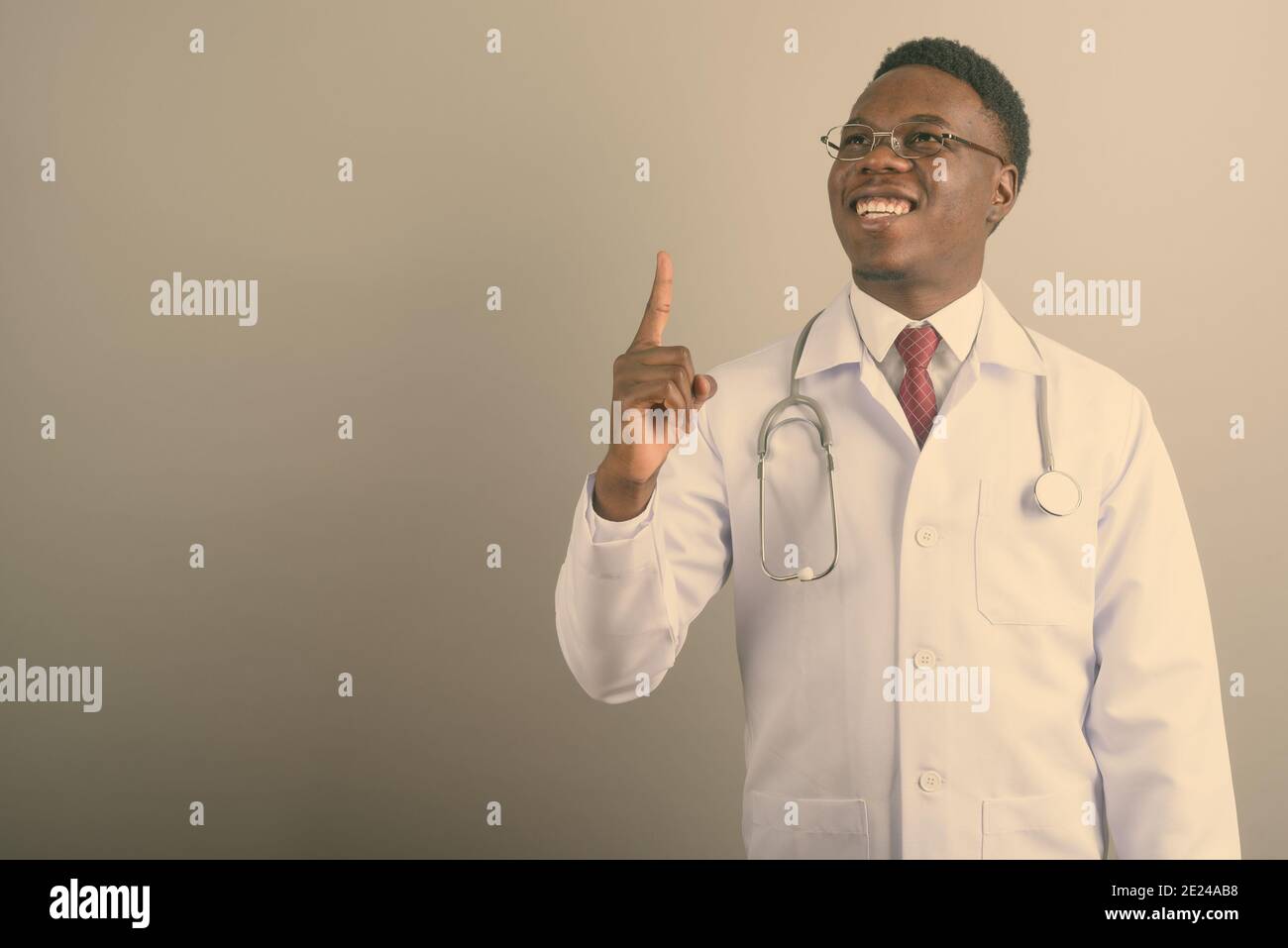 African american doctor looking up hi-res stock photography and images ...