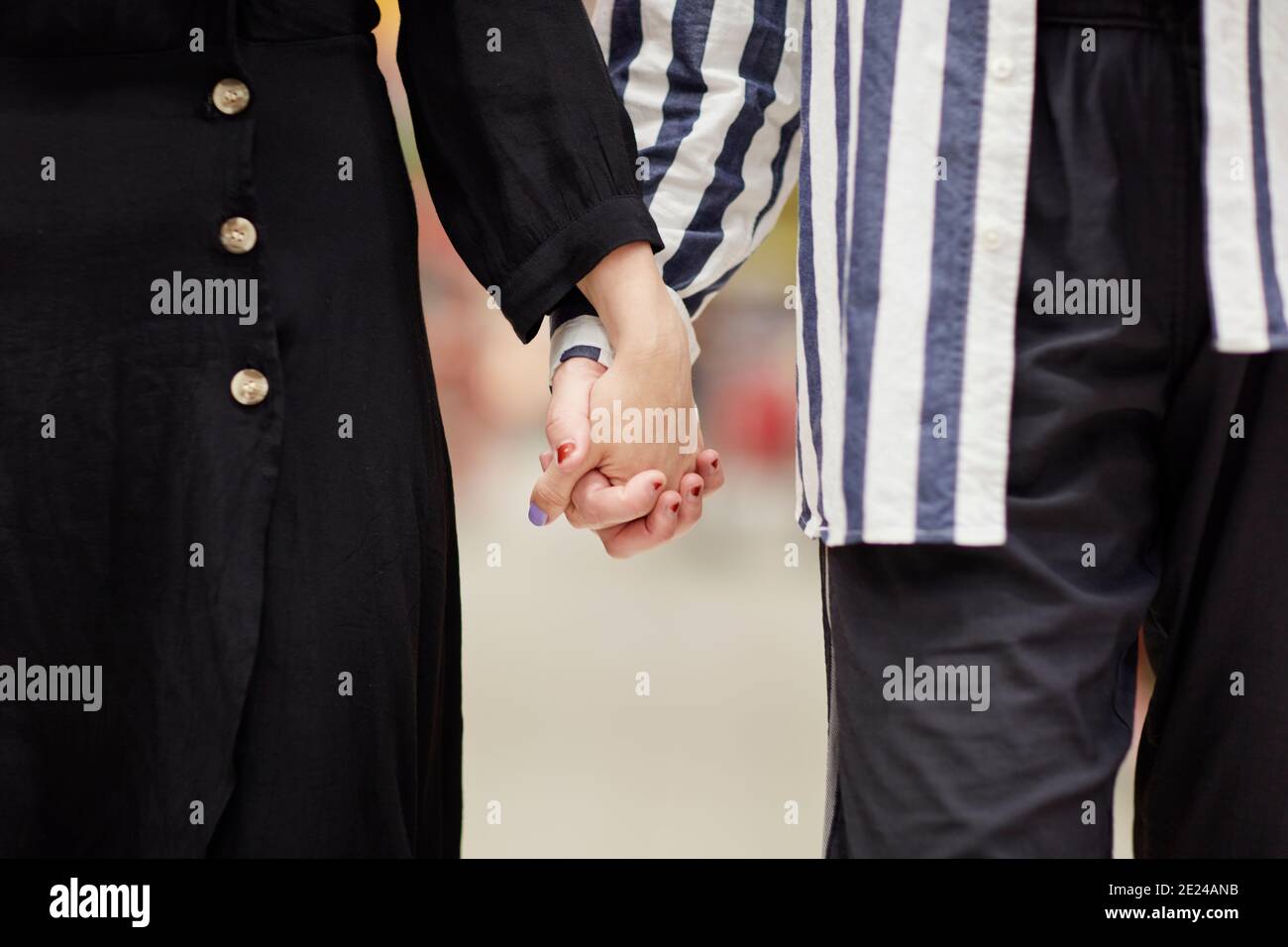 Couple holding hands Stock Photo