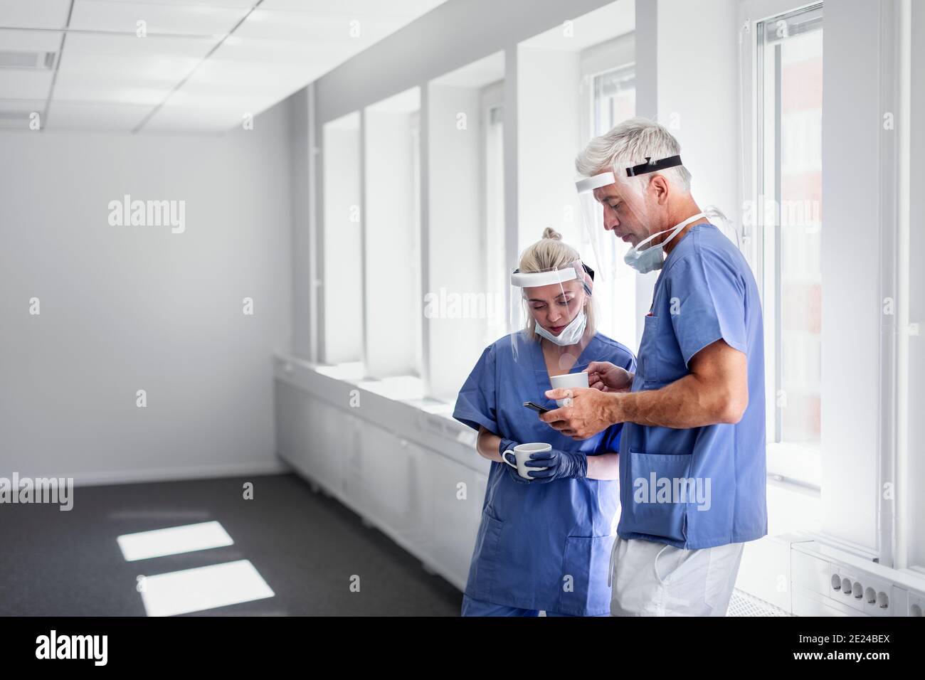 Doctors wearing personal protective equipment Stock Photo