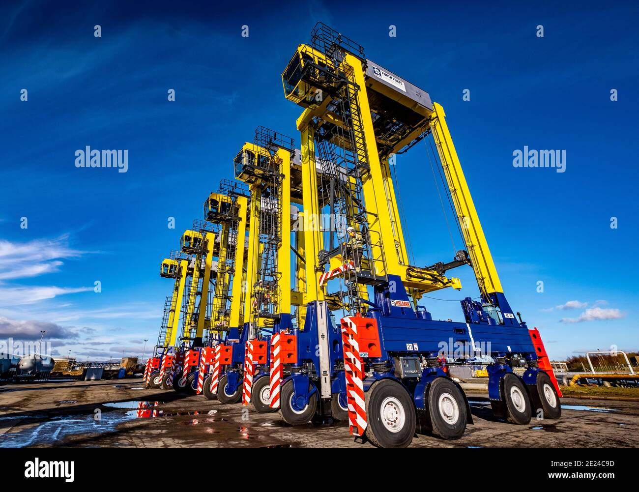 Straddle Carriers at dockside Stock Photo