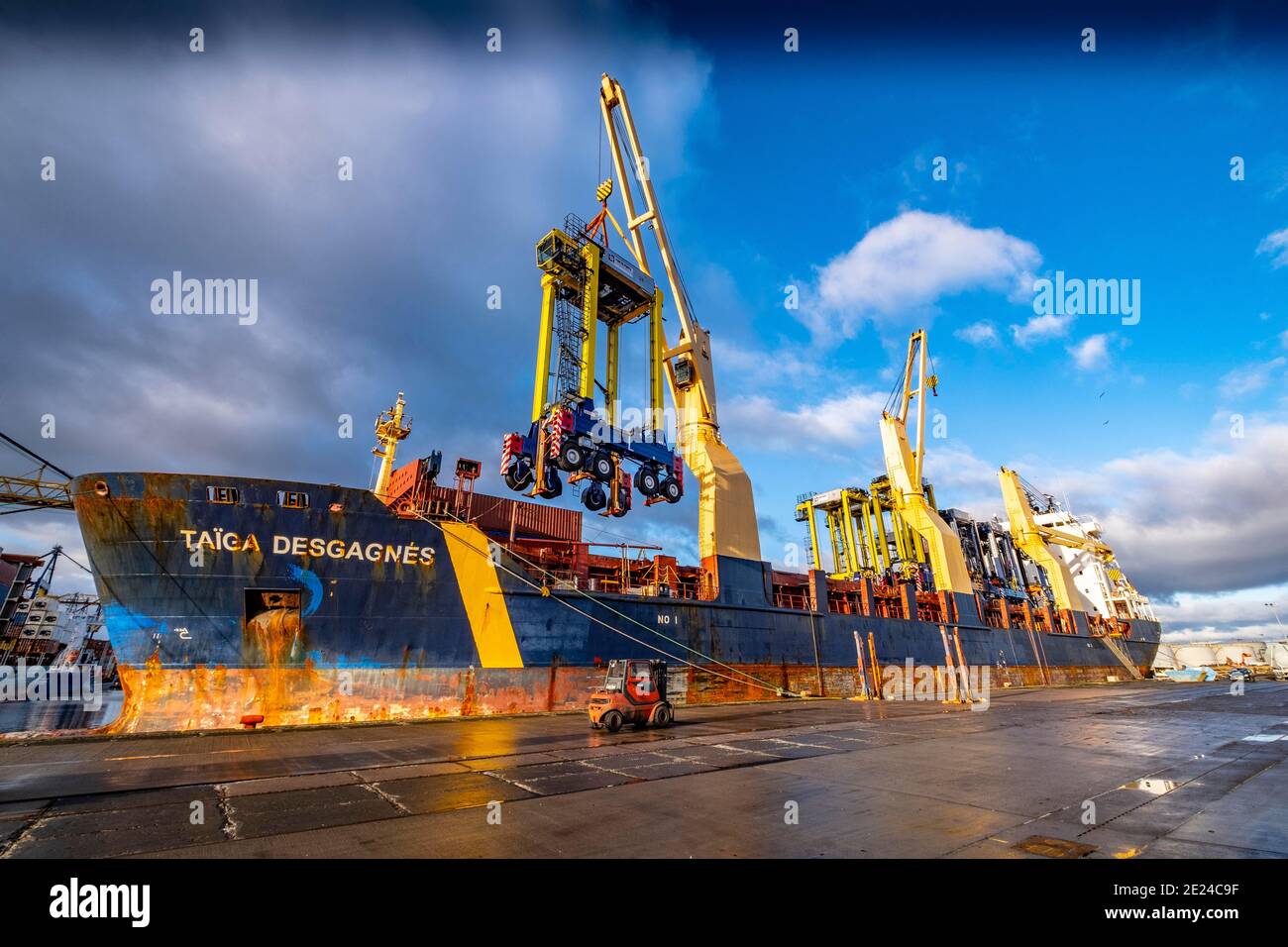 Straddle Carriers at dockside Stock Photo